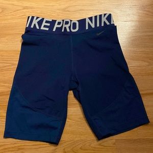 Nike pro mesh panel mid thigh shorts
